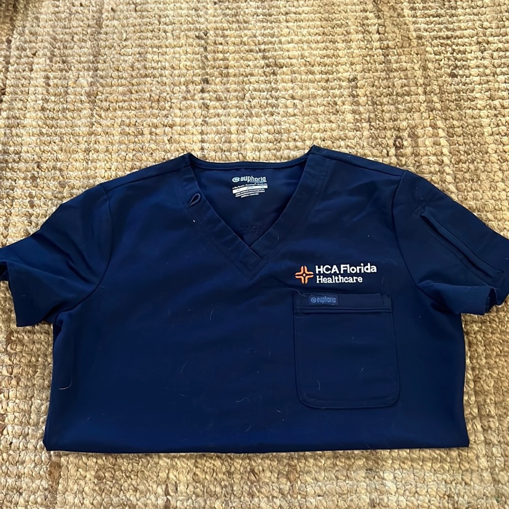 HCA scrub top